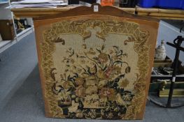 An embroidered panel.