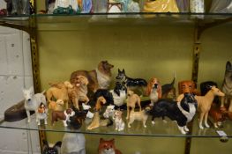 A quantity of Beswick dogs.