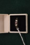 A decorative dress ring.