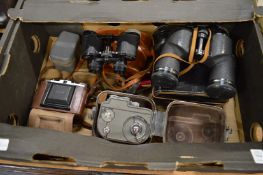 Various binoculars and cameras.