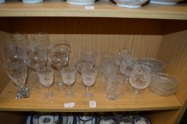 A shelf of glassware.
