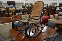A good ebonised bentwood rocking chair, probably by Thonet.