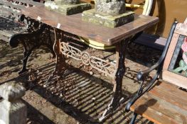 Cast iron table base with later top.
