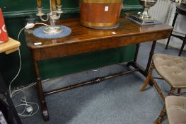 A 19th century mahogany two drawer side table.