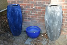 Three resin planters.