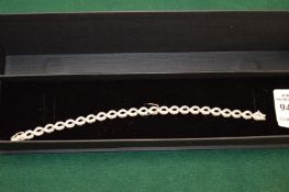 A good 18ct white gold and diamond bracelet.