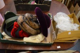 A quantity of ladies hats.