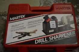 A boxed drill bit sharpener.