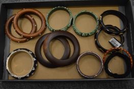 A quantity of decorative bangles.
