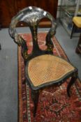 A Victorian papier mache and cane seated occasional chair.