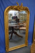 A decorative gilt framed pier mirror.