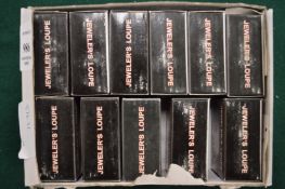 A set of six jewelers loupes.