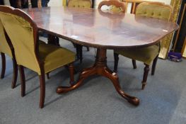 A good Georgian design mahogany twin pillar dining table with two leaves.