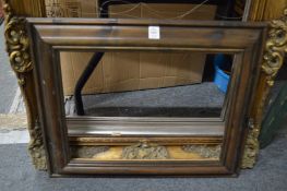 Three various picture frames.