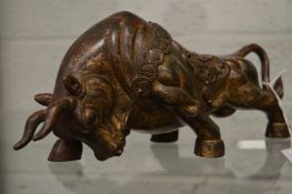 A Chinese bronze charging bull.