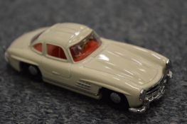 A Dinky model of a Mercedes.