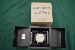 An Omega Swatch Mission to Jupiter wristwatch with original box and papers.