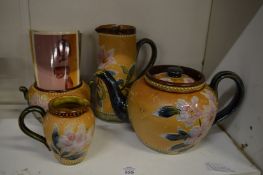 A Royal Doulton four piece tea set comprising teapot, hot water jug, cream jug and sugar bowl.
