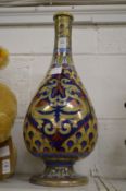 An Italian lustre decorated bottle vase.