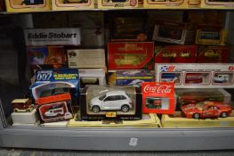 A group of model and die-cast cars etc, boxed.