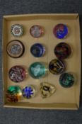 A collection of glass paperweights.