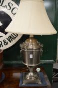 A good large brushed steel urn shaped table lamp and shade.
