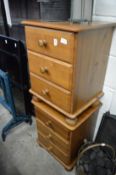 A pair of pine bedside chests.