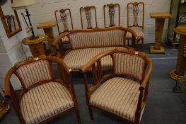 A good late Victorian seven piece mahogany stained beech framed salon suite comprising pair of