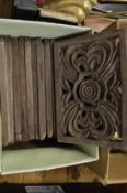 A set of pierced and carved wooden panels.