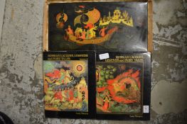 Books of Russian lacquer boxes together with a Russian lacquer panel.