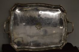 A large silver plated twin handled tray.