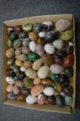 A collection of hard stone eggs.