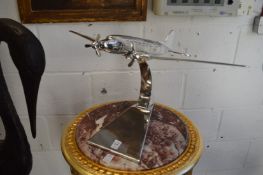 A cast aluminium model of a Dakota on stand.