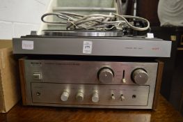 An old turntable and amplifier.