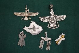 A group of decorative pendants etc.