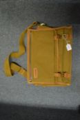 A Sandstorm canvas and leather trimmed laptop case with shoulder strap.