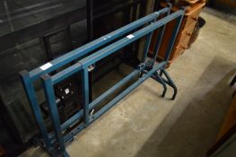 A pair of plasterers scaffold board stands.