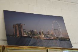 Two large unframed photographic prints.