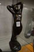 Pollet, a bronze standing female figure.