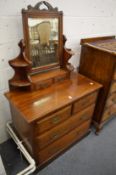 A Victorian walnut dressing chest.