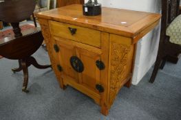 A Chinese soft wood altar cabinet.