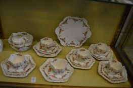 A floral decorated part tea service.