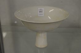 A Chinese blanc de chine stem cup.