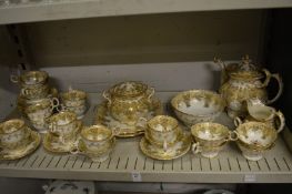 A late 19th century gilt decorated part tea service.