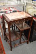 A Chinese hard wood and marble inset stand.