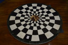 A specimen marble circular table top.