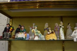 A collection of Doulton figures and figurines.