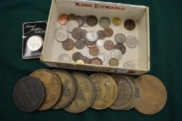 Bronze medallions and coins.