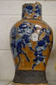A large Chinese vase (neck damaged).