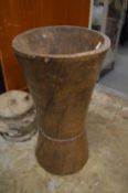 A large African carved wood mortar.